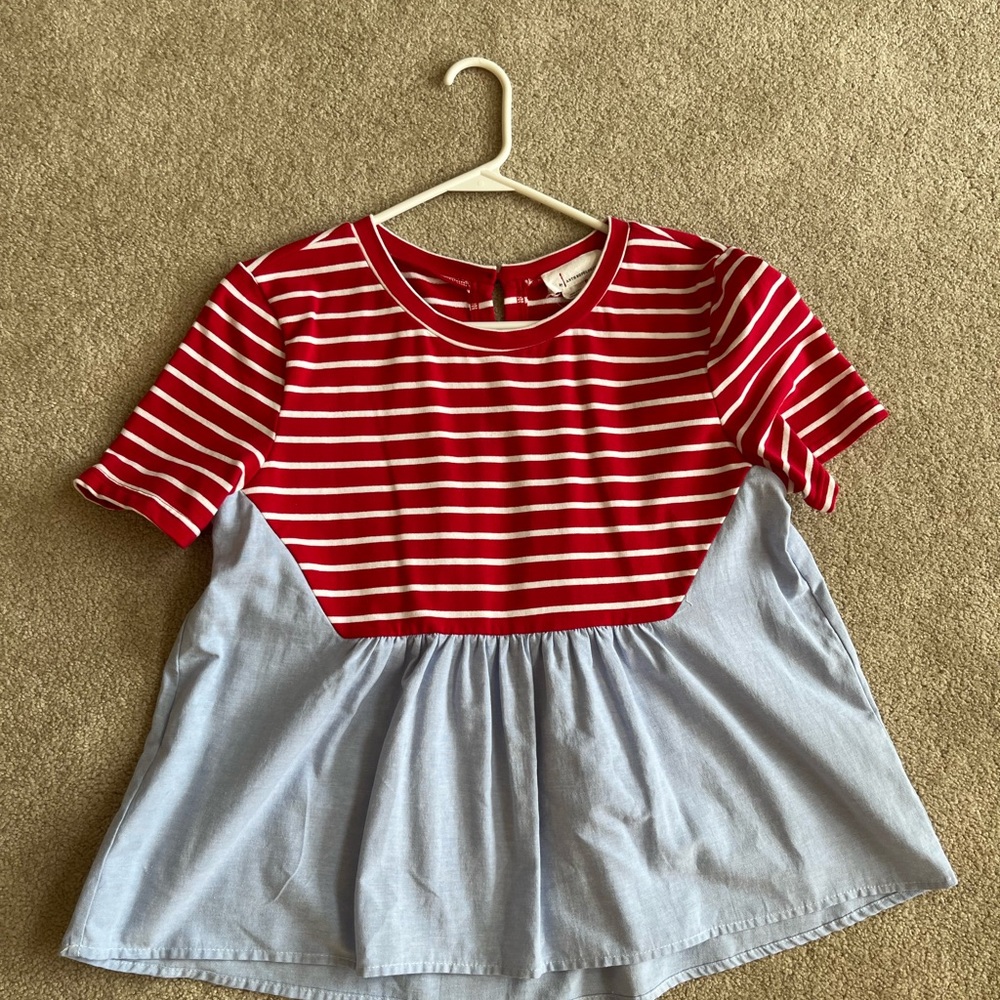 Women’s Anthropologie mixed media peplum top.